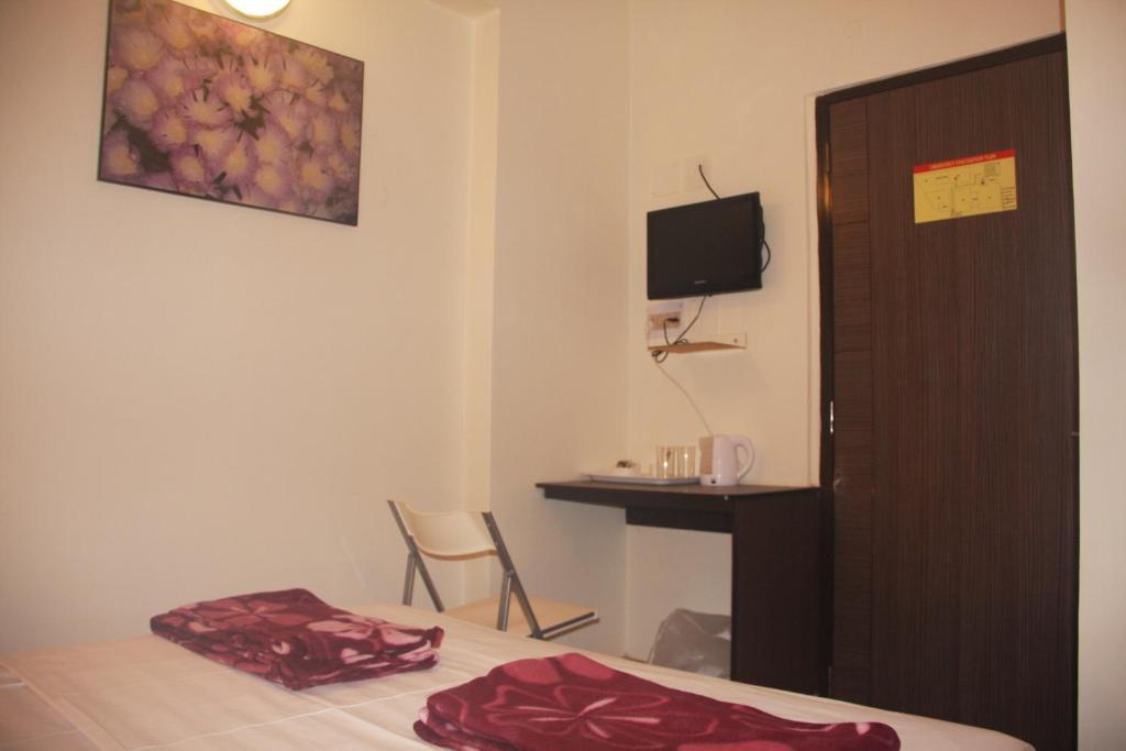 Down Town Guest House Калькутта Номер фото
